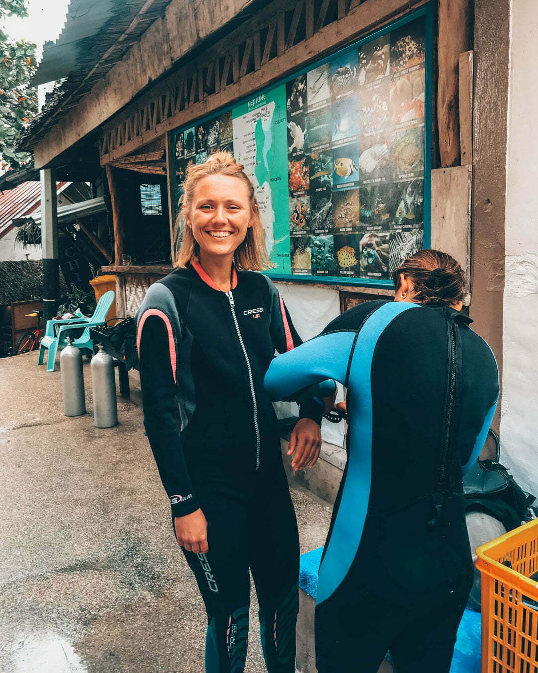 An image of a scuba diver preparing for a dive in Moalboal