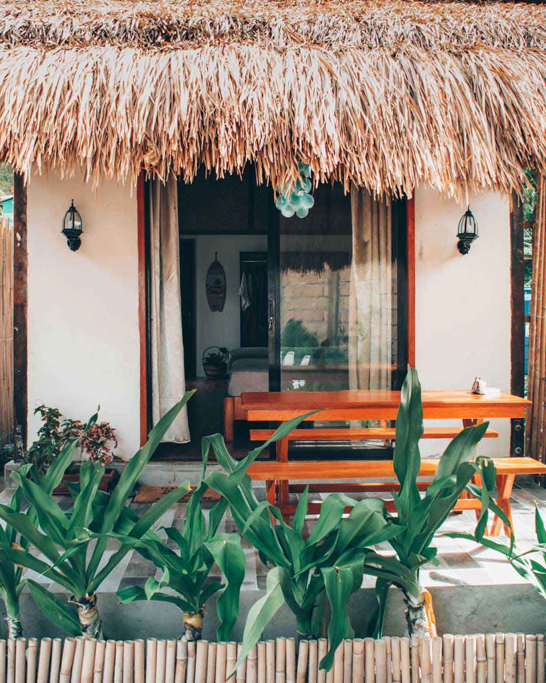 the entrance to a beach villa