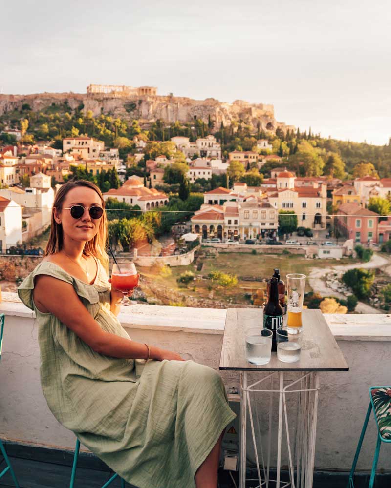 DSC00290-2_1080x1350 Woman at rooftop bar with acropolis in the background